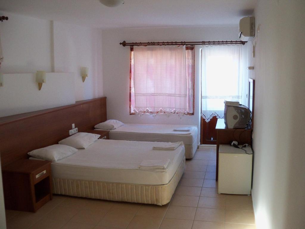 Poseidon Hotel Side Quarto foto